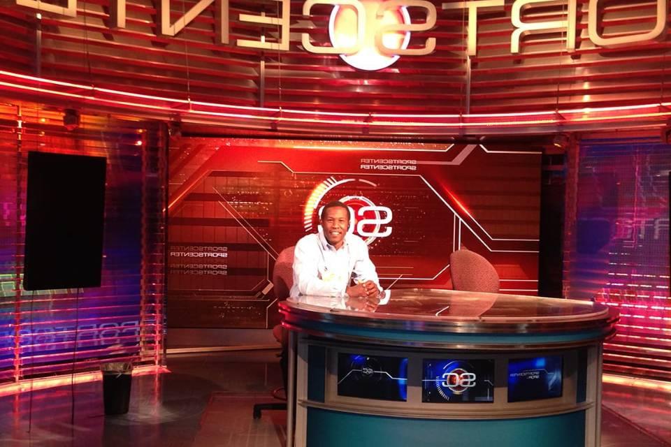 Beasley sits behind the SportsCenter desk at ESPN